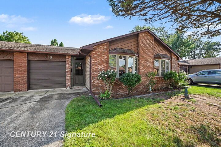 Property Photo:  118 Erin Court  MI 48611 