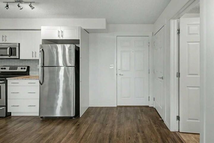Property Photo:  755 Copperpond Boulevard SE 3210  AB T2Z 4R2 