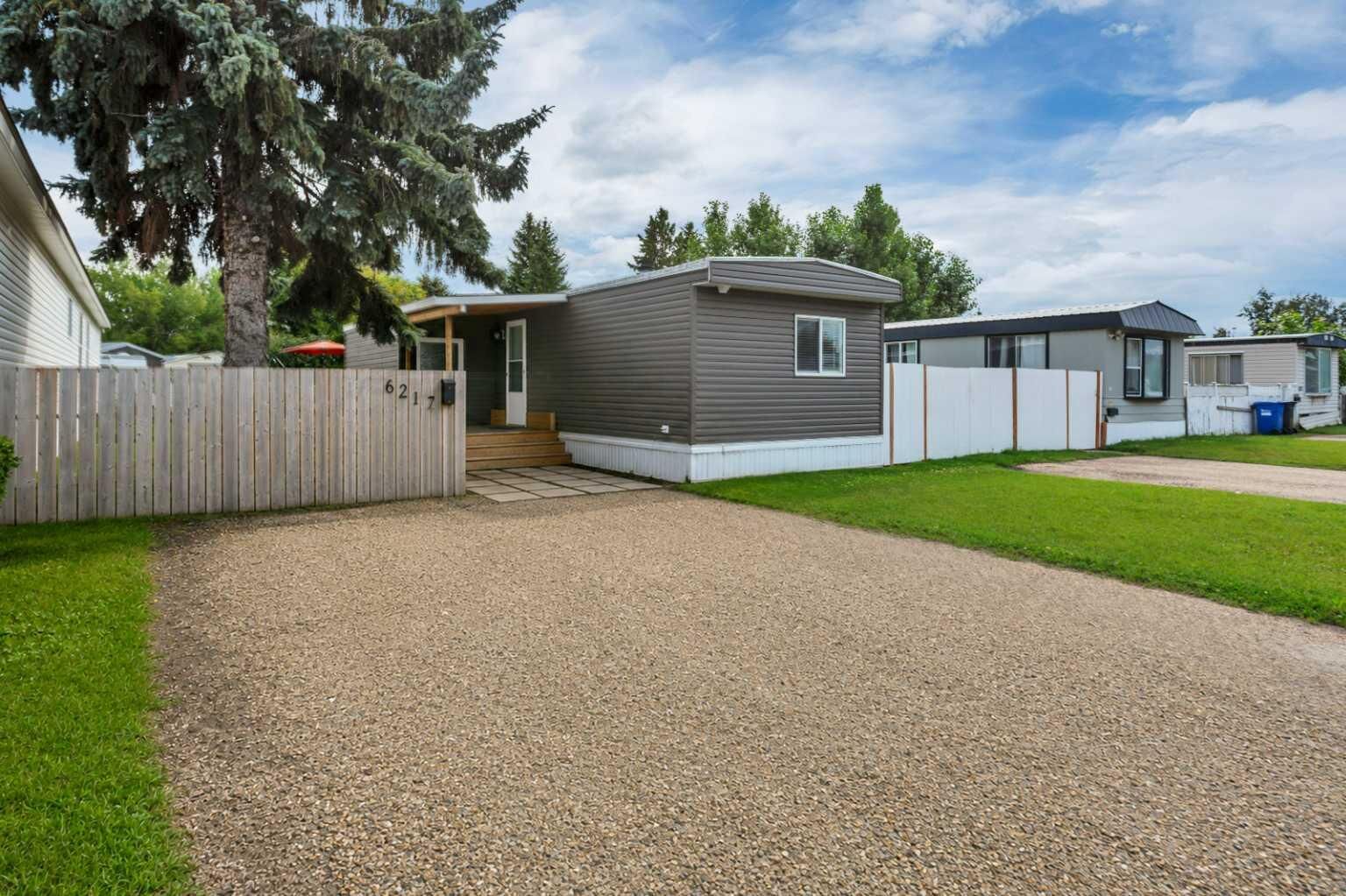 Property Photo:  6217 Galbraith Street  AB T4P 1Y2 