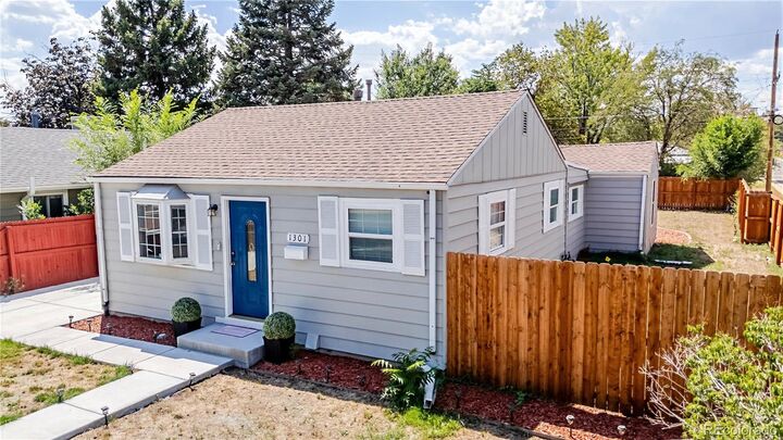 Property Photo:  1301 S Wolff Street  CO 80219 