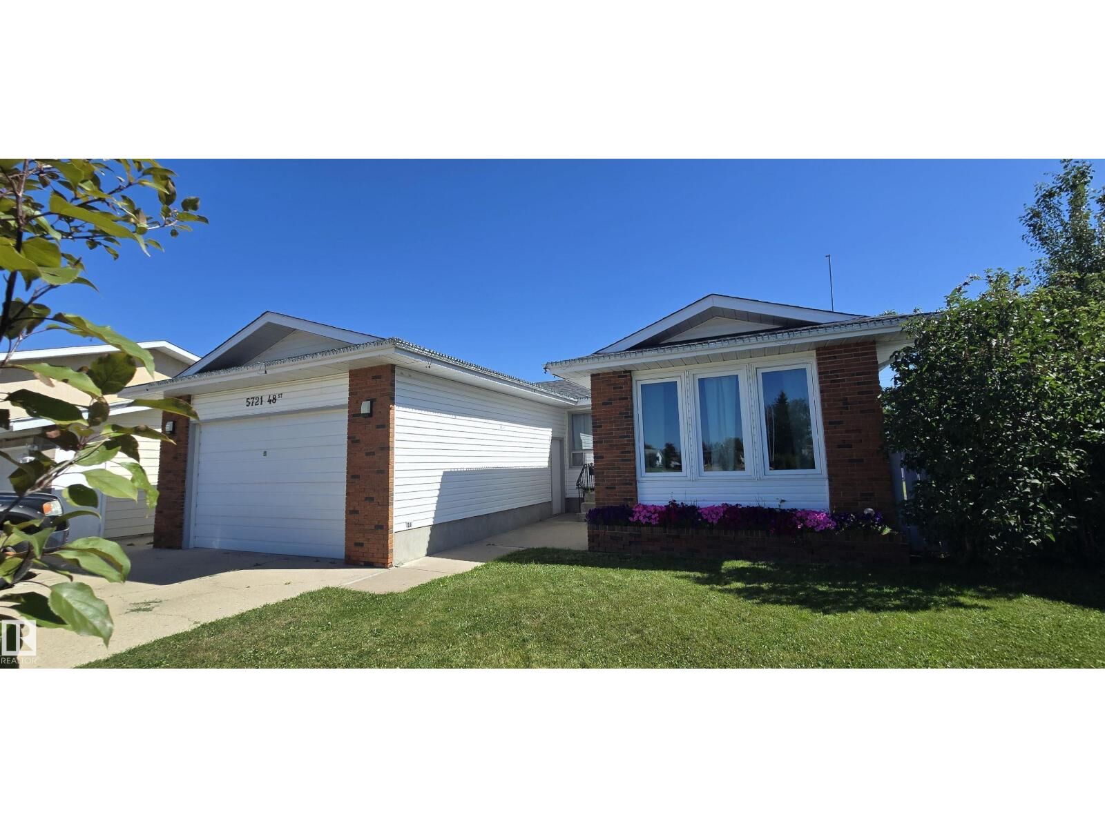 Property Photo: 5721 48 St AB T9C 1G9