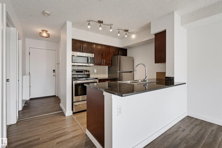 Property Photo:  1060 McConachie Boulevard NW 309  AB T5Y 0W9 