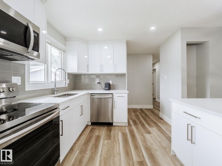 Property Photo:  15011 59 Street NW  AB T5A 1Y6 