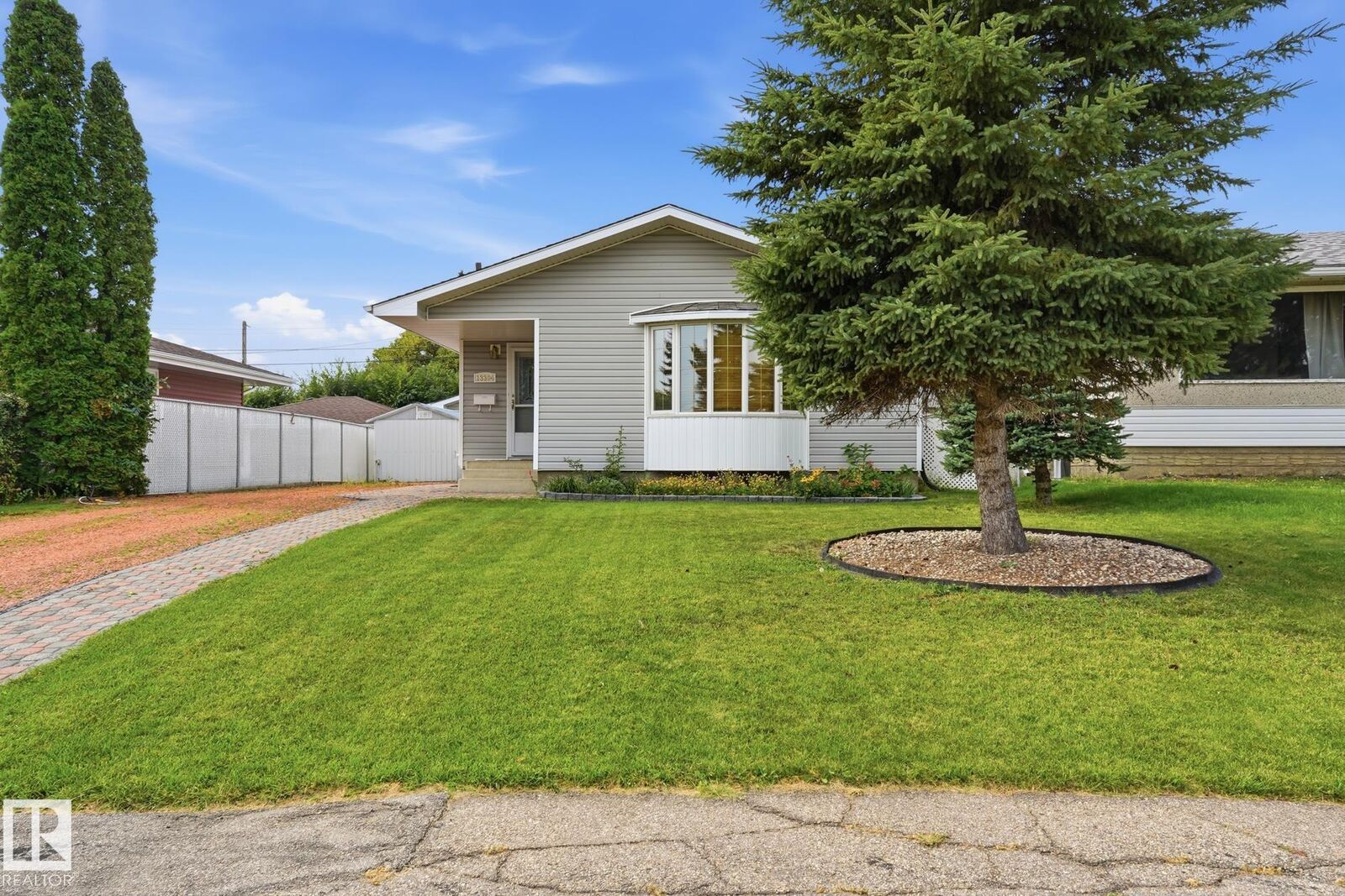 Property Photo:  13304 63 Street NW  AB T5A 0X1 