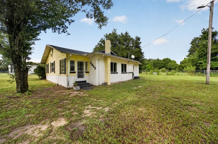 Property Photo:  11855 SE 141st Terrace  FL 32179 