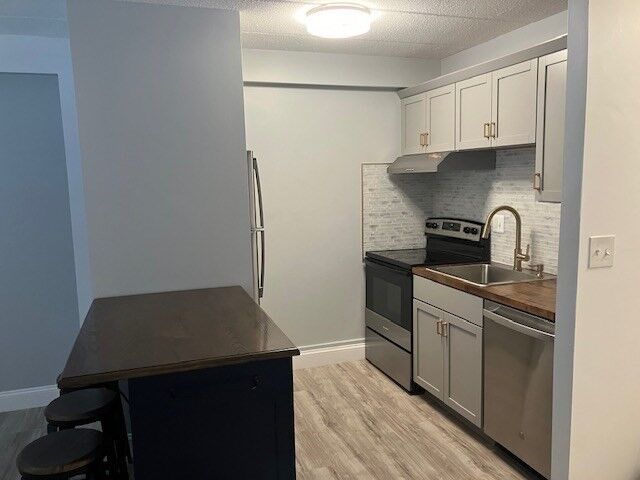 Property Photo:  1000 Lexington St 16  MA 02452 