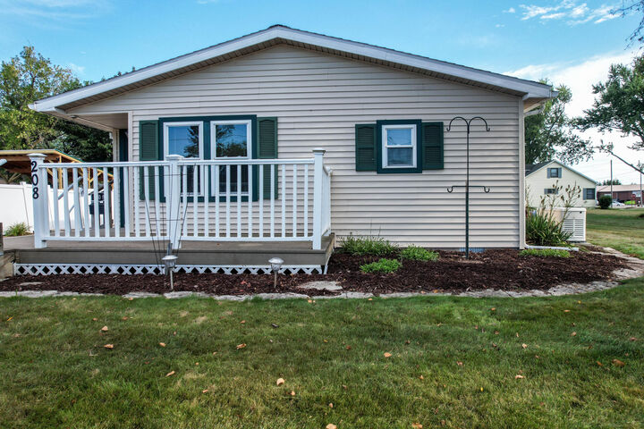 Property Photo:  208 Duncan Avenue  MI 49721 