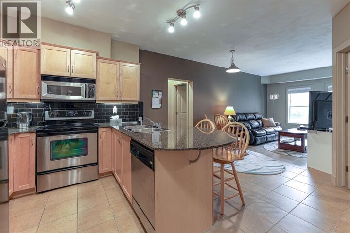 Property Photo: 11811 Lake Fraser Drive Southeast AB T2J 7J1