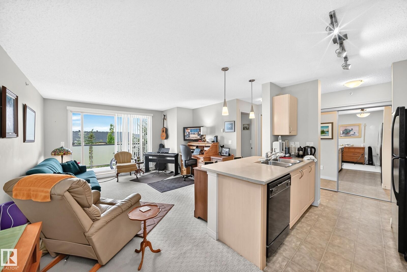 Property Photo:  13907 136 Street NW 418  AB T6V 1Y5 