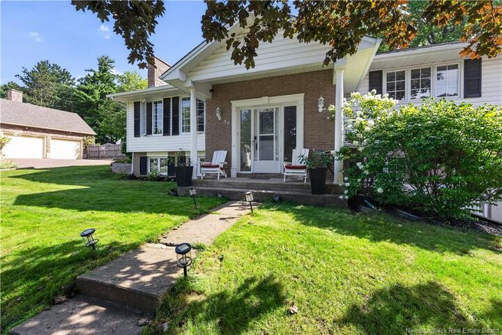Property Photo: 56 Fairway Boulevard NB E1B 1T3