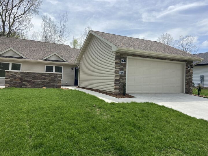Property Photo:  723 Violet Way  MI 49085 