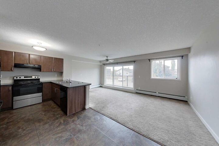 Property Photo:  709 6 Avenue SE 205  AB T0G 2A3 