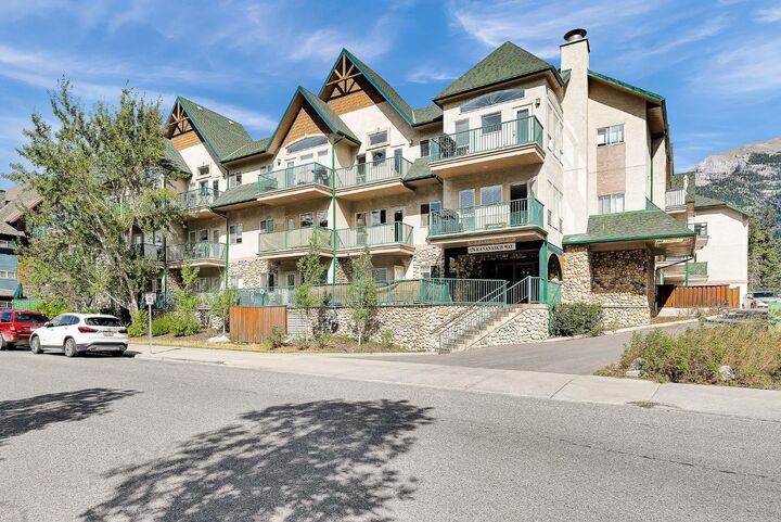 Property Photo: 176 Kananaskis Way 201 AB T1W 3E4