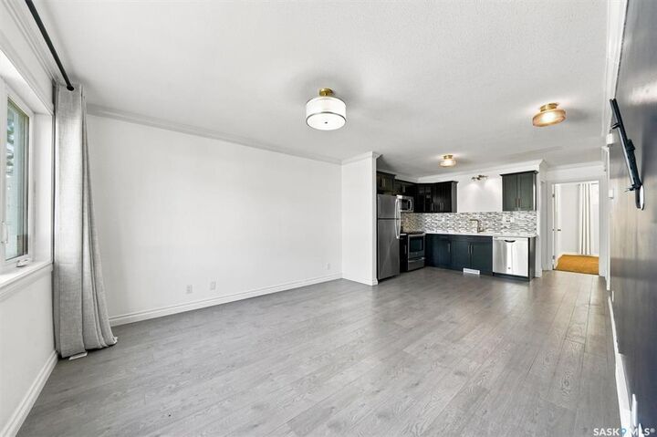 Property Photo: 225 Hassard Close 211 SK S7L 2W8