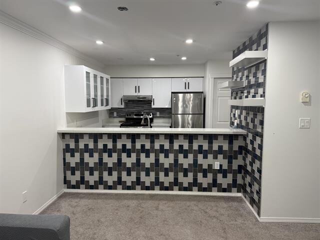 Property Photo:  12739 72 Avenue 207  BC V3W 4E8 