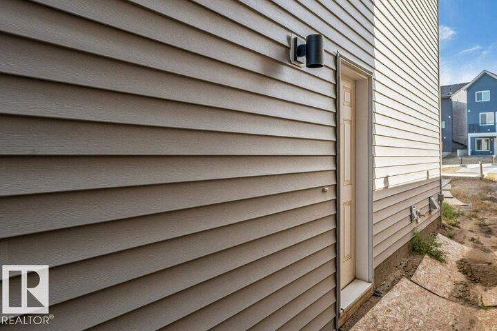 Property Photo:  4582 Warbler Loop NW  AB T3N 1R5 