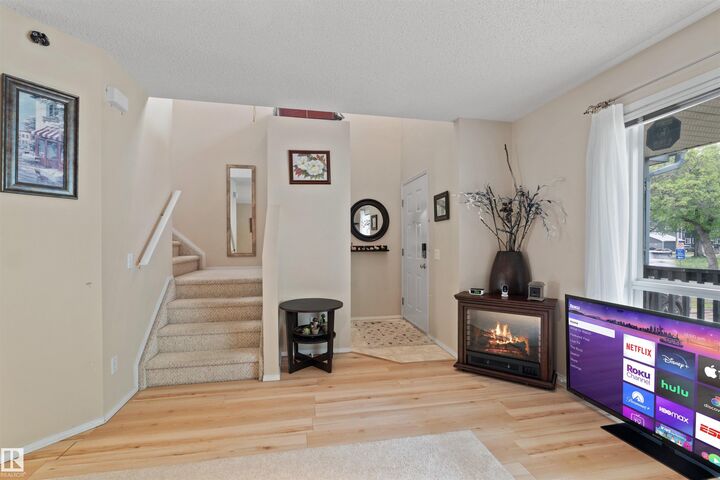 Property Photo:  10909 106 Street NW  AB T5H 4M7 