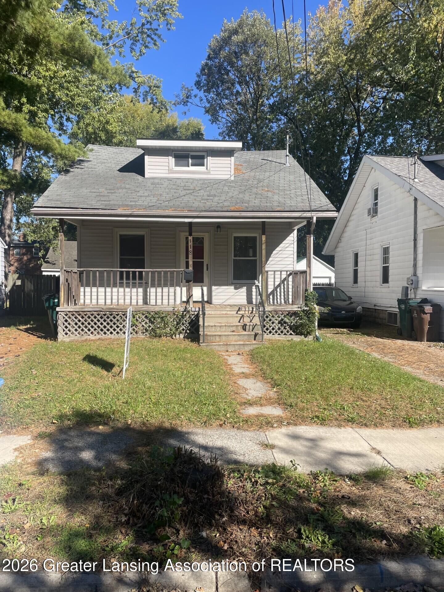 Property Photo:  1118 Berten Street  MI 48910 