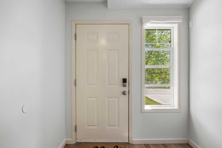 Property Photo: 27 Panatella Villas NW AB T3K 0G7