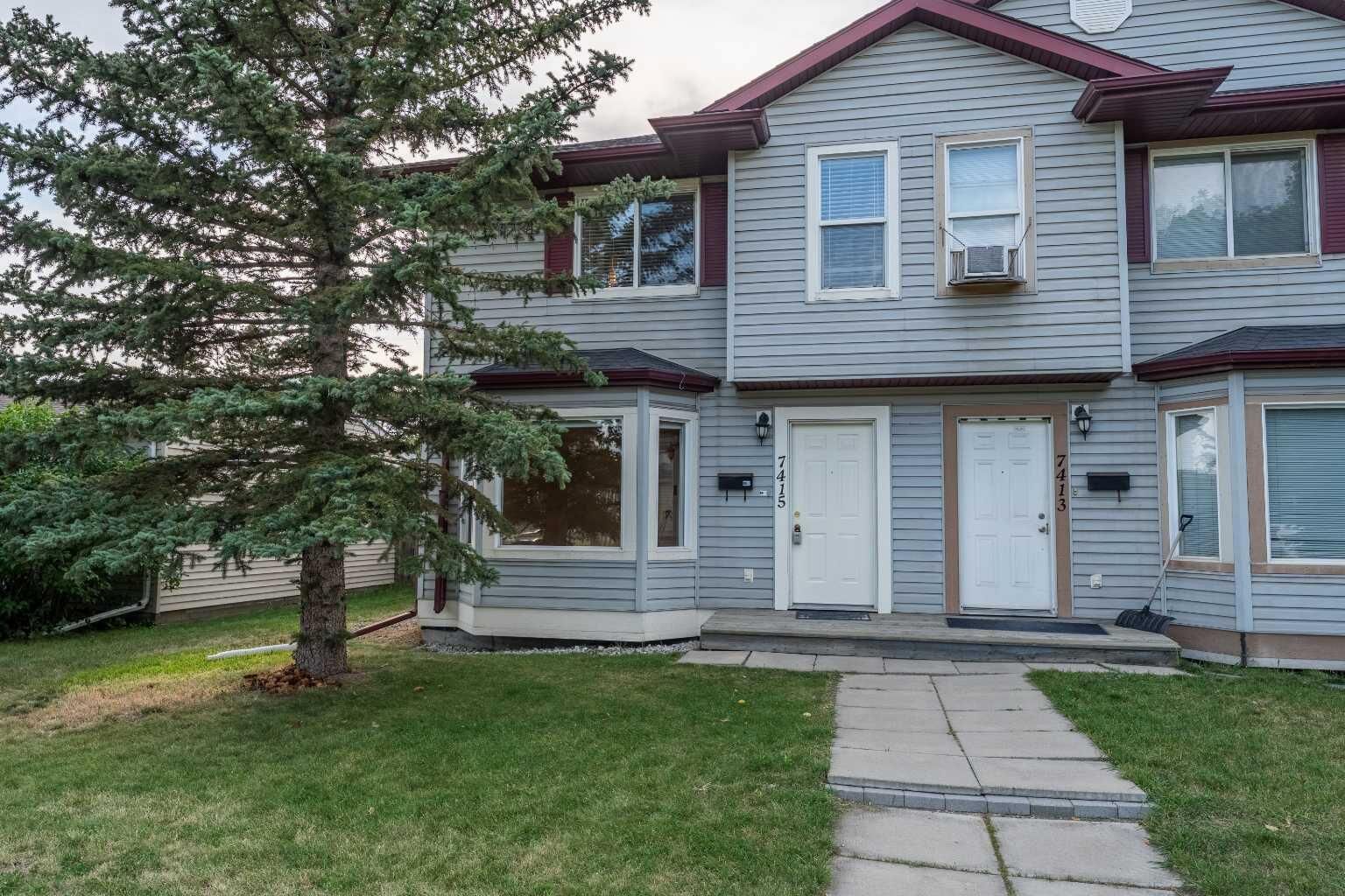 Property Photo:  7415 26A Street SE  AB T2C 1E3 