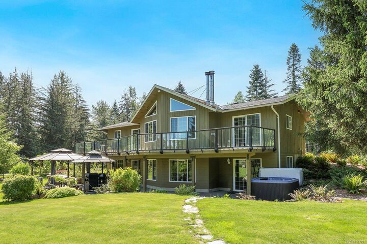 Property Photo:  5427 Wildwood Rd  BC V9J 1P5 