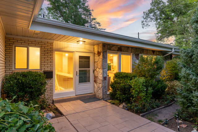 Property Photo: 4496 S Fortuna Way E UT 84124
