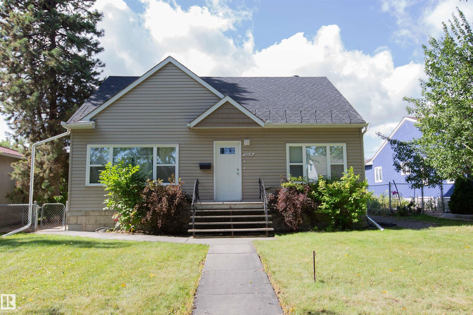 Property Photo:  12228 134 Street NW  AB T5L 1T7 
