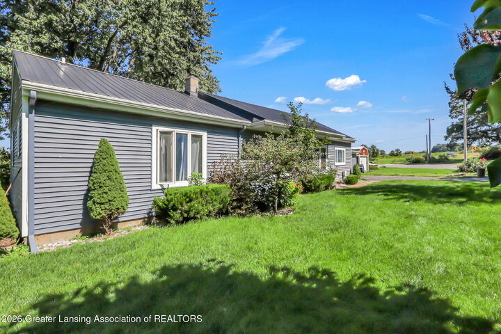 Property Photo: 116 E Coats Grove Road MI 49058