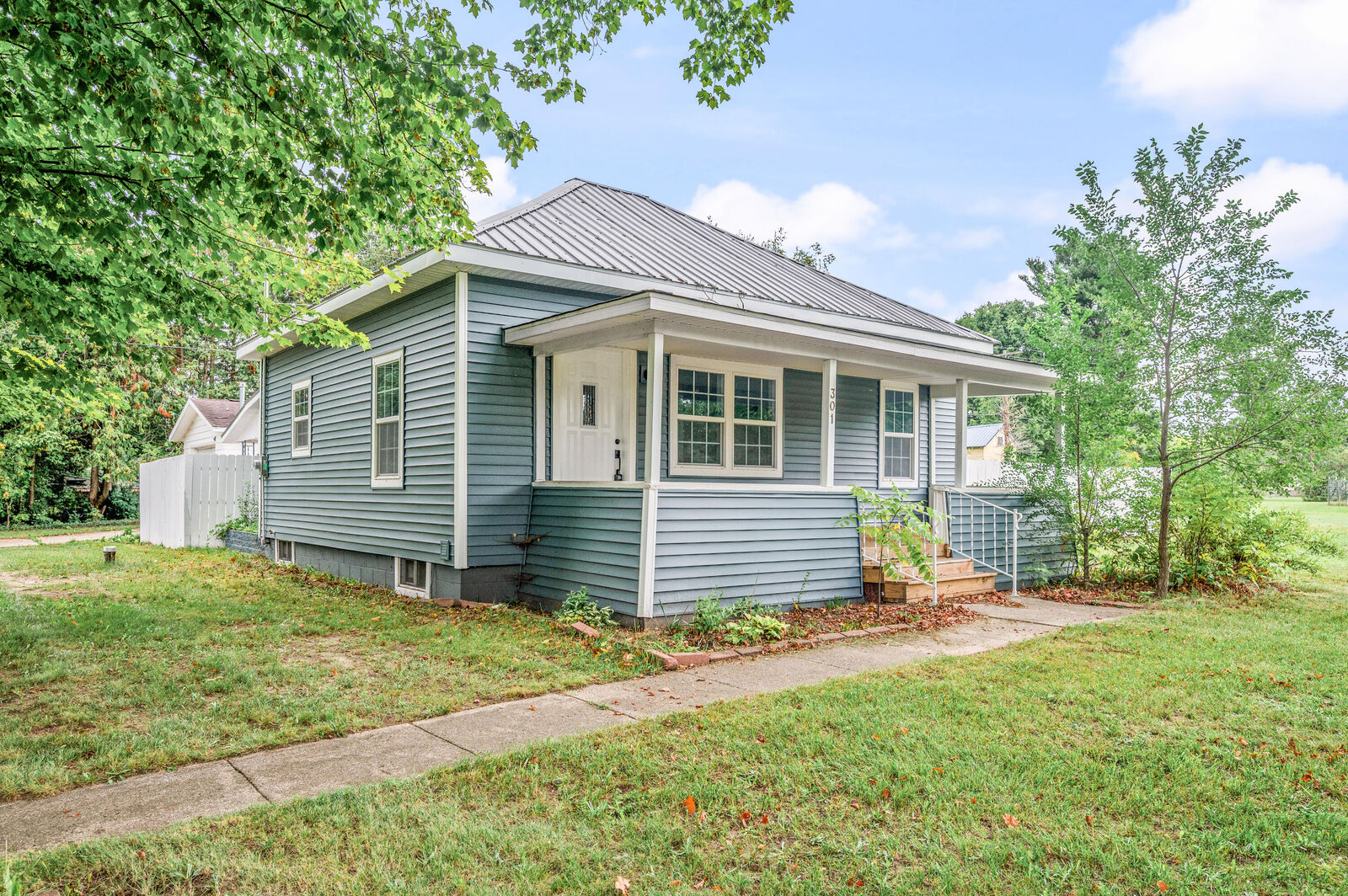 Property Photo:  301 E Angel Avenue  MI 49305 