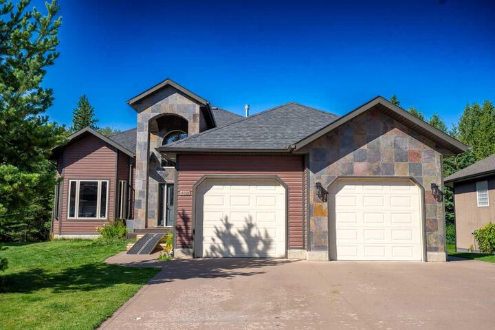 Property Photo:  7402 61 Street  AB T4T 0A3 