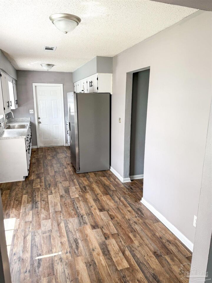 Property Photo:  6255 Memphis Ave  FL 32526 