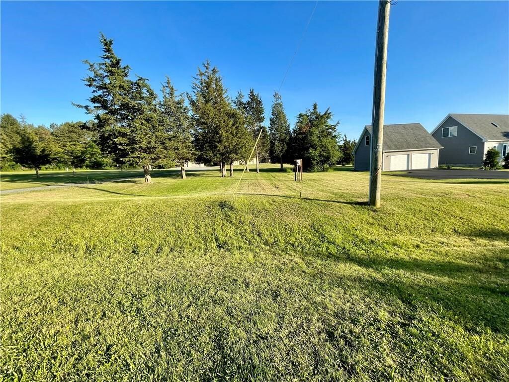 Property Photo:  5764 Sunset Court  NY 14541 