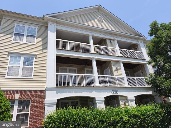 Property Photo:  42492 Mayflower Terrace 203  VA 20148 