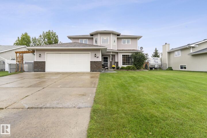 Property Photo:  48 Mill Road  AB T8R 1N7 