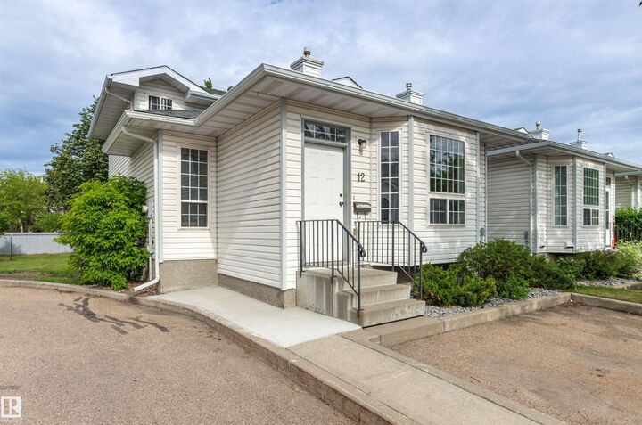Property Photo:  3311 58 Street NW 12  AB T6L 6X3 