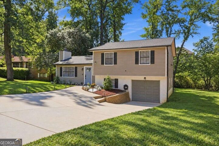 Property Photo:  3316 Alcazar Drive SW  GA 30047 