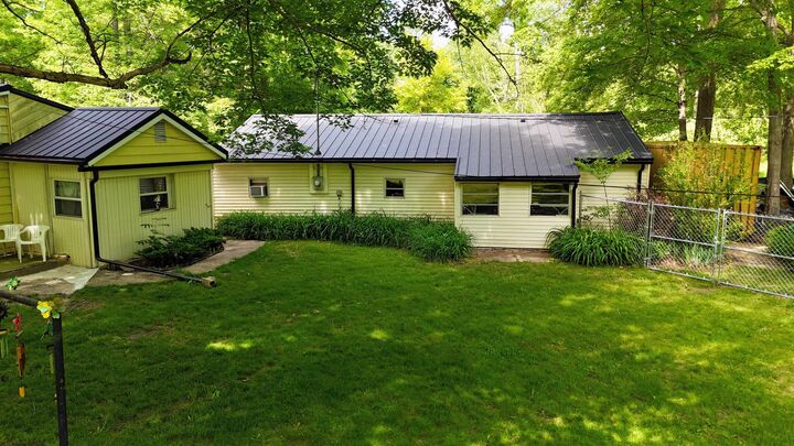 Property Photo:  836 Poquonnock Drive  MI 48628 