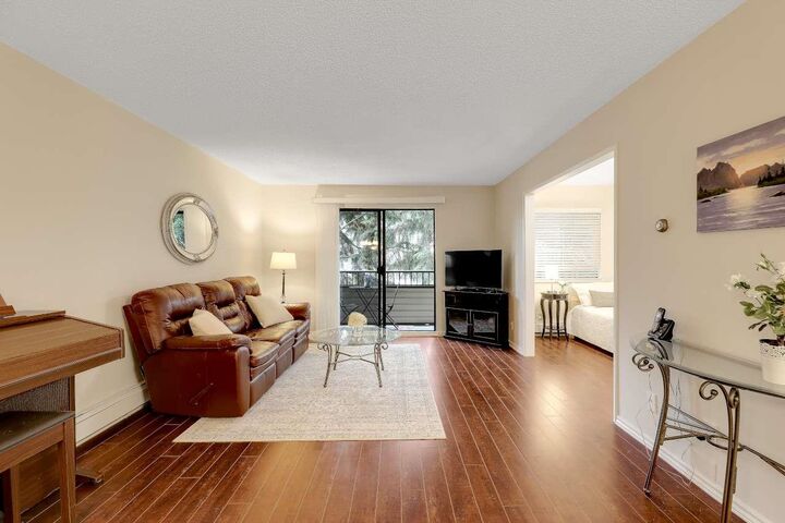 Property Photo:  20460 54 Avenue 211  BC V3A 6N6 