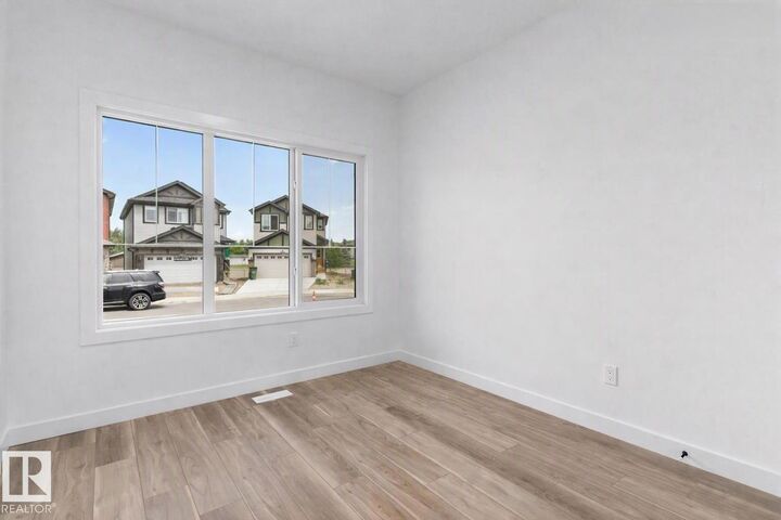 Property Photo:  589 177 Avenue NE  AB T5Y 4P6 