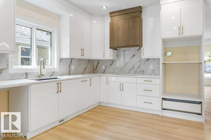 Property Photo:  10323 79 Street NW  AB T6A 3G7 