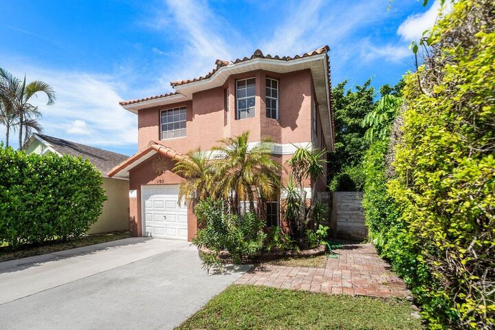 Property Photo:  105 Plumage Lane  FL 33415 