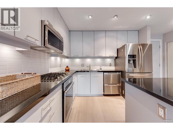 Property Photo: 530 Raven Woods Drive 210 BC V7G 2T5