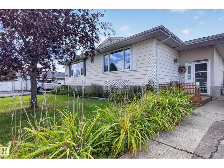 Property Photo:  13214 38 St NW  AB T5A 3G4 