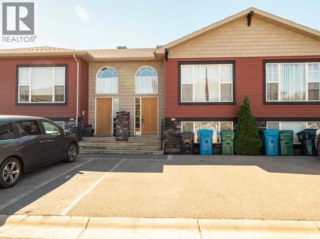 Property Photo:  885 Mount Sundance Manor West  AB T1J 1X7 