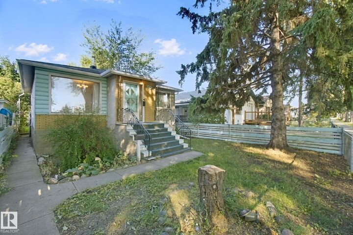 Property Photo:  12126 57 Street NW  AB T5W 3W1 