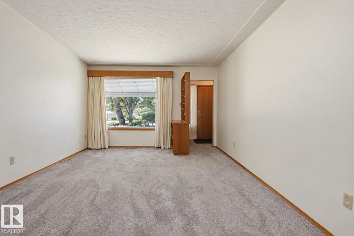 Property Photo: 10339 80 Street NW AB T6A 3J3