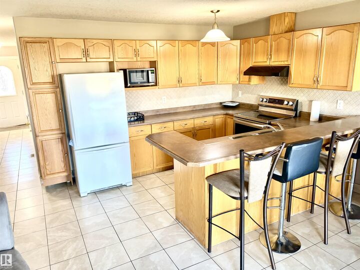 Property Photo: 16317 64 Street NW 17 AB T5Y 3M3
