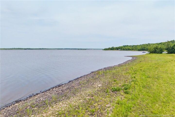 Property Photo:  388 Cox Point Road  NB E4A 2X7 