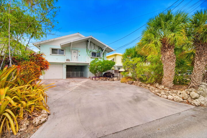 Property Photo: 147 Gardenia Street FL 33070