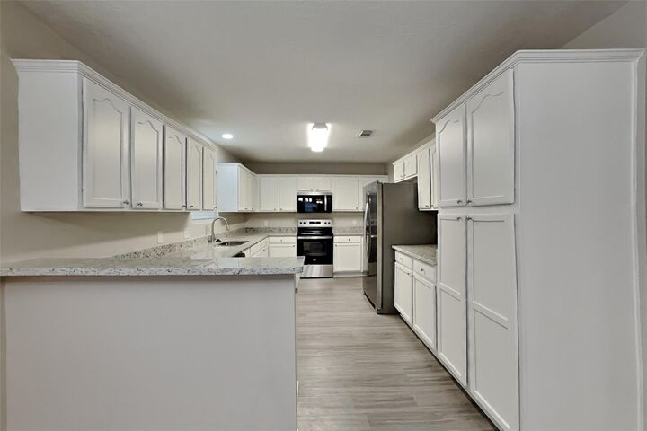 Property Photo:  2457 Ripplewood Drive  TX 77384 